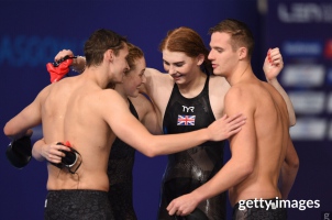 image celebrating bronze in the 4x200m mixed relay